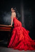 Woman Vintage Red Dress Old Castle Beautiful Princess In Seductive Dress photo