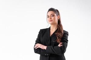 Young business woman arms crossed in black jacket standing studio isolated on white background. photo