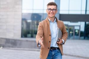 Business. Businessman Giving Hand For Handshake Welcome Gesture photo