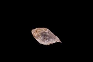 Macro stone gypsum mineral on black background photo