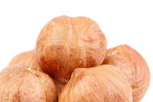 macro hazelnuts nuts on a white background photo