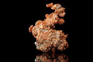 Macro mineral stone Copper on black background photo