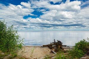 beautiful landscape of the sea against the background of a blue sky with clouds photo