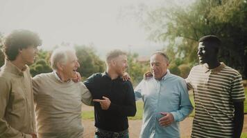 a group of men standing together in a park video