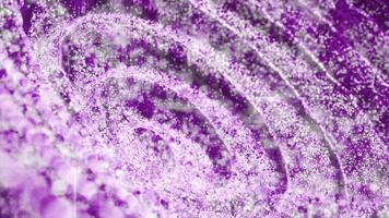 Abstract purple color floating shiny particles futuristic 3d background, glowing glitter particles background video