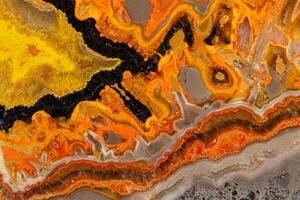 Macro mineral stone Bee jasper on a gray background photo