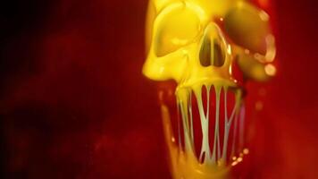 a yellow skull with a mouth open video