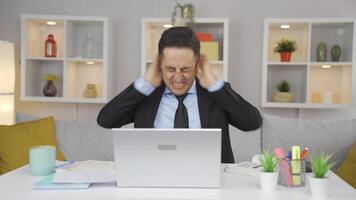 Home office worker man having a nervous breakdown. video