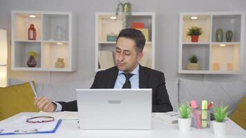 Home office worker man feels physical good. video