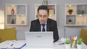 Home office worker man taking a break from his work