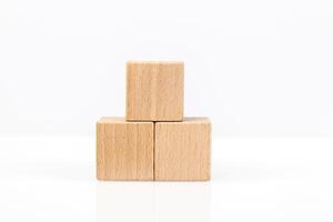Wooden cubes on a white background photo