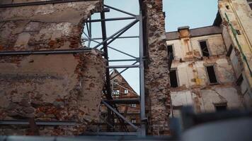 Historical Contrast. Ancient Building with Metal Carcass Inside video