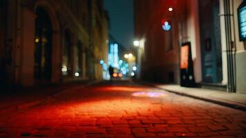 floue photo de une ville rue à minuit avec rouge trottoir lumière video