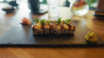 Sushi Sensation. Close-Up of Delicious Sushi Roll on Black Plate, Perfect Finger Food Dish video