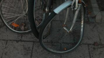 Urban Dilemma. Row of Bikes Parked on Sidewalk with Broken Wheels video