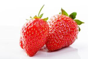 beautiful and ripe red strawberries on a white background photo