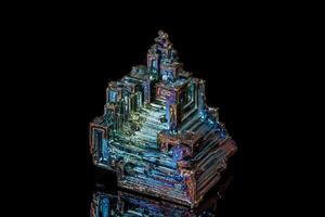 Macro of the stone bismuth mineral on a black background photo