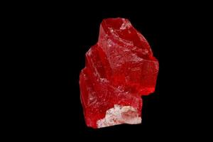 macro mineral stone Rhodochrosite on a black background photo