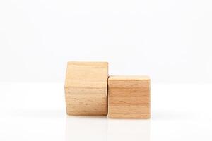 Wooden cubes on a white background photo