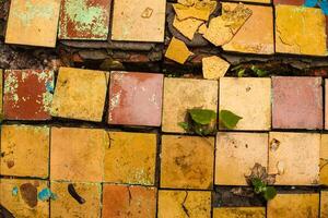 Cracked retro tiles floor background texture photo