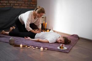 Relax and enjoy in spa salon, getting thai massage by professional masseur. photo