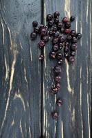 Closeup on black background. Summer currant berry dessert. photo