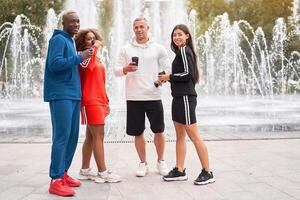 Multi-ethnic group people teenage friends. African-american, asian, caucasian student spending time together Multiracial friendship photo