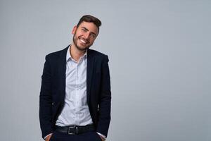 Close up portrait young man businessman. Caucasian guy business suit studio gray background. photo