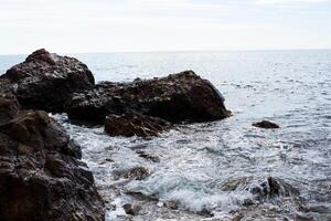 stone in the sea or ocean photo