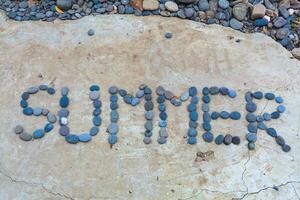 inscription stones on sea plane photo