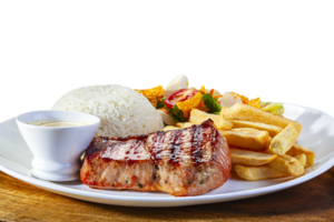 Grilled pork steak with rice, french fries and salad png
