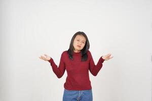 Young Asian woman in Red t-shirt Confused I don't know gesture isolated on white background photo