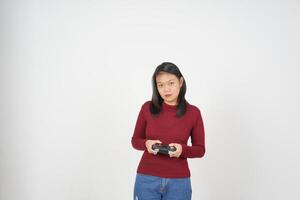 Young Asian woman in Red t-shirt holding game controller, Playing game isolated on white background photo