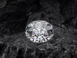 diamond on black coal background photo