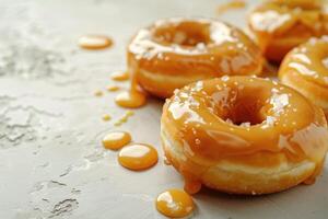 AI generated Donuts in salted caramel glaze on a light background with copy space photo