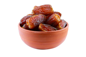 Dates fruit in a clay bowl isolated on a transparent background png