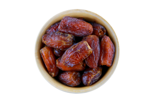 Dried dates in a bowl isolated on a transparent background. png