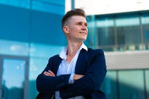 Business. Businessman Standing City Street Near Office Building photo