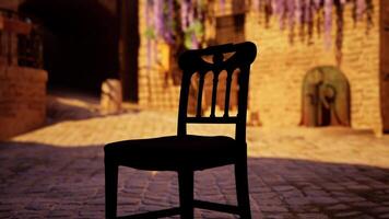 A wooden chair sitting on top of a brick floor video