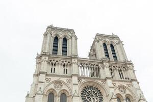 FRANCE. PARIS JUNE 01, 2018 Tourists visiting the Cathedrale Notre Dame de Paris is a most famous cathedral 1163 - 1345 on the eastern half of the Cite Island. photo