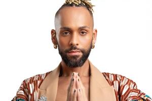 Afro-american gay man portrait with prayer hands photo