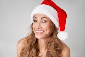 mujer Navidad Papa Noel sombrero blanco estudio antecedentes foto