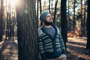 Outdoor portrait of handsome bearded man . Casual autumn fashion portrait photo