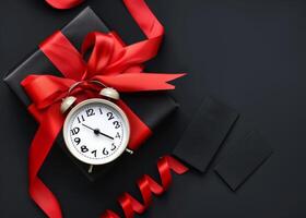 AI generated Black gift box with red ribbon and alarm clock on black background photo