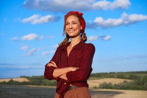 Woman farmer standing farmland smiling Female agronomist specialist farming agribusiness Happy positive caucasian worker agricultural field photo