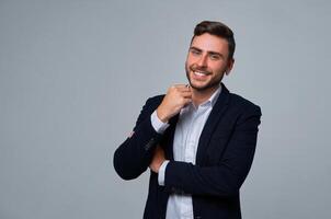 Close up portrait young man businessman. Caucasian guy business suit studio gray background. photo