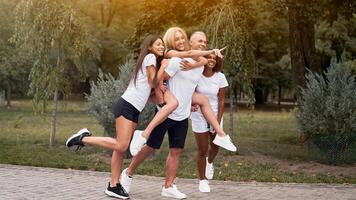 Multi-ethnic group people teenage friends. African-american, asian, caucasian student spending time together Multiracial friendship photo