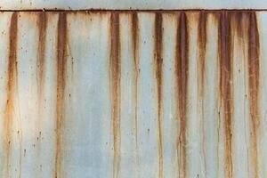 A rusty corrugated iron metal texture. photo