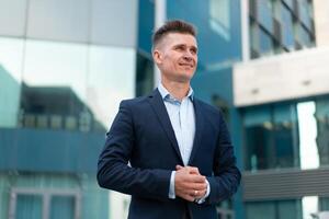 Business. Businessman Standing City Street Near Office Building photo