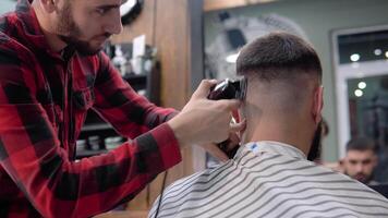 High quality hairdressing services for men in the barbershop. Vertical video